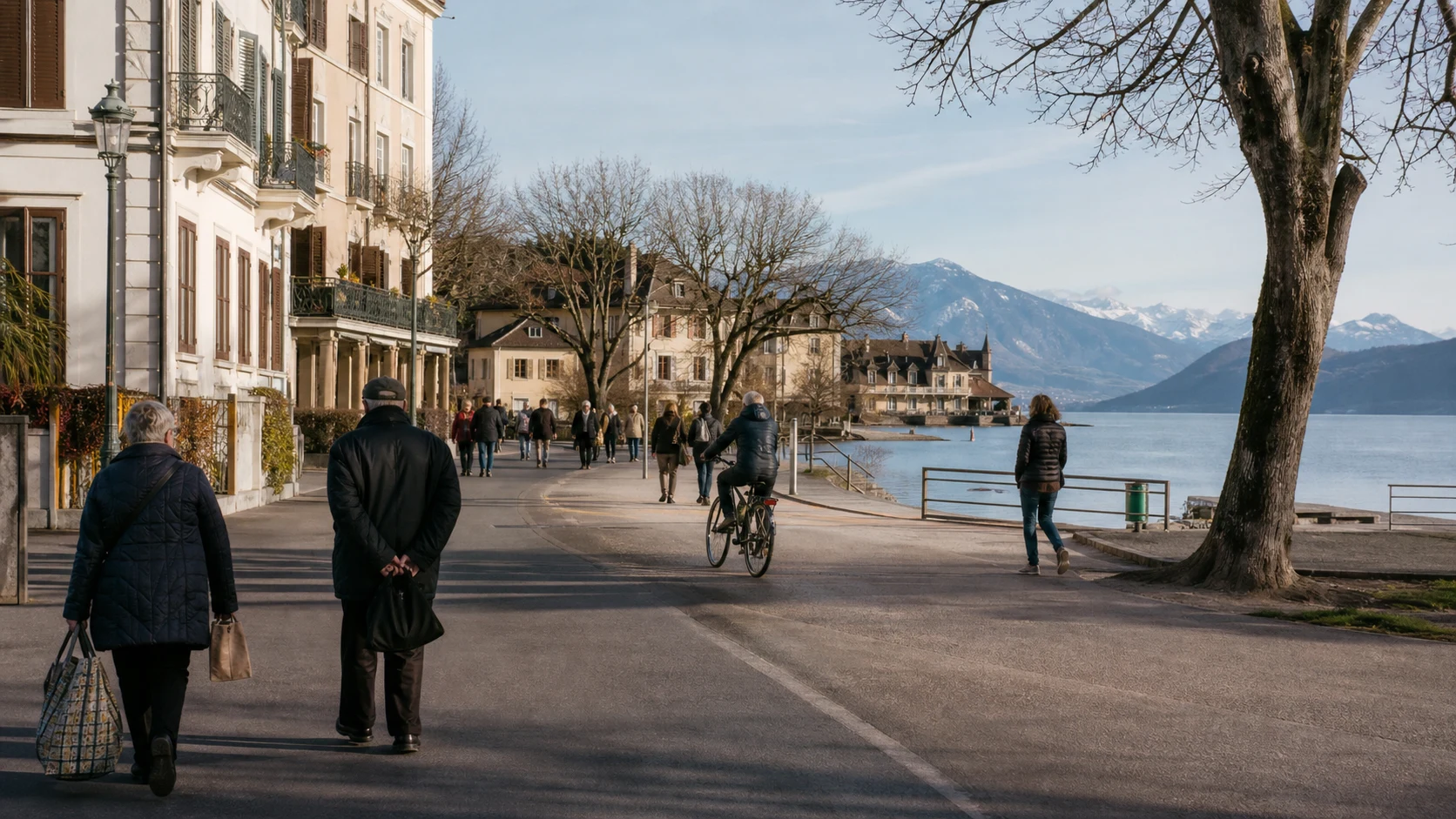 Residents walking and cycling between Annecy city streets and the lake on an ordinary morning