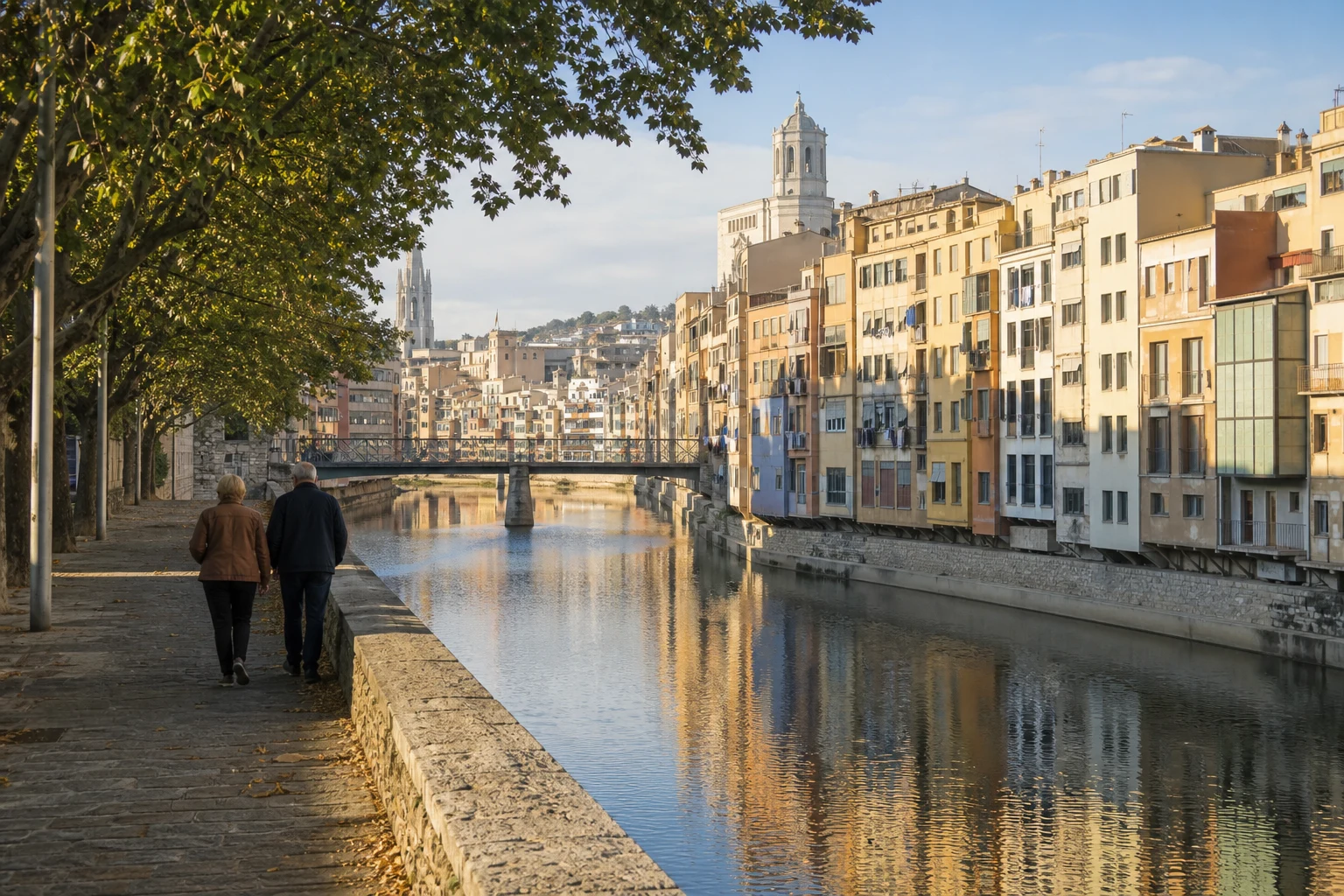 Girona riverside neighbourhood and old city in warm morning light