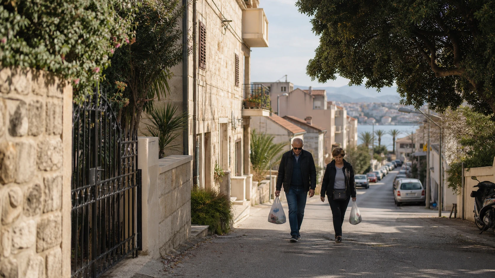 Older residents walking through a shaded Split neighbourhood near a market