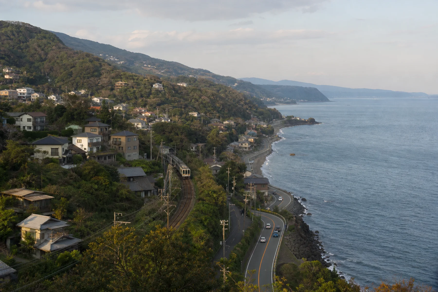 Homes, railway and road on the steep eastern Izu coast
