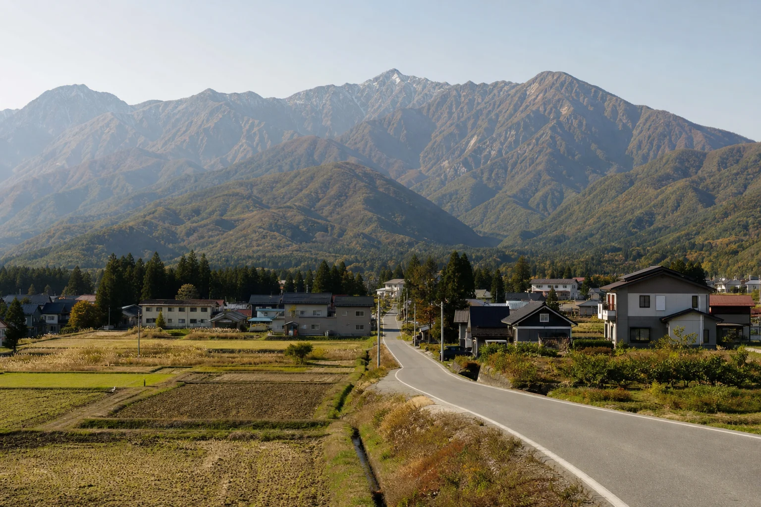 Hakuba village homes and fields beneath the Northern Japan Alps