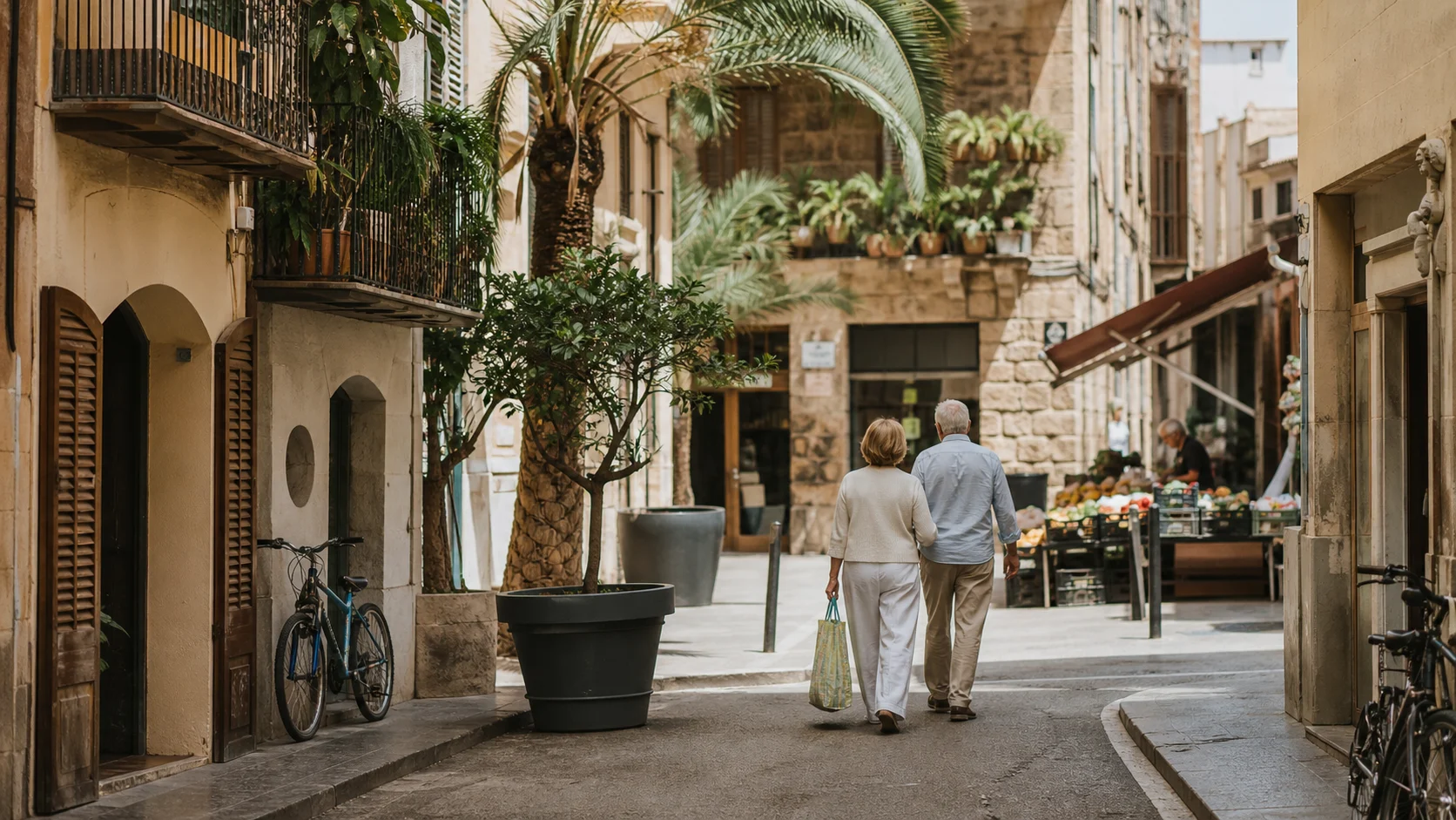 Mature residents walking through a shaded Palma neighbourhood near a market