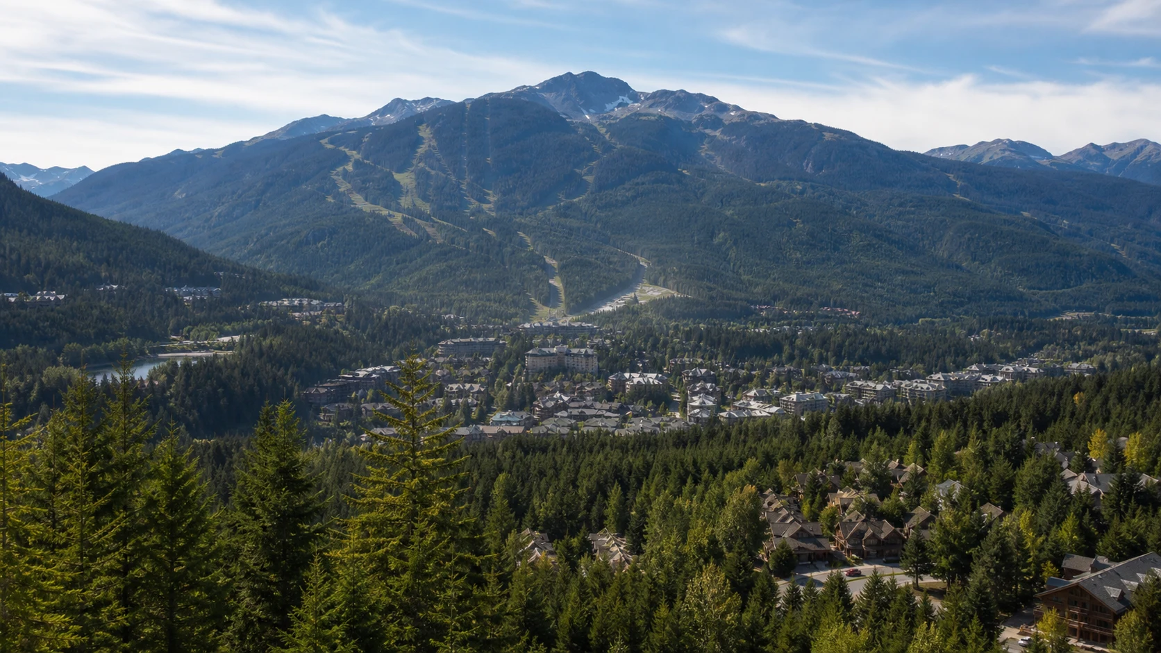 Whistler valley and forested neighbourhoods beneath Whistler and Blackcomb mountains in summer